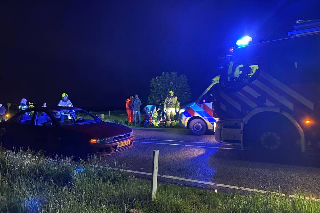 Auto te water, meerdere gewonden