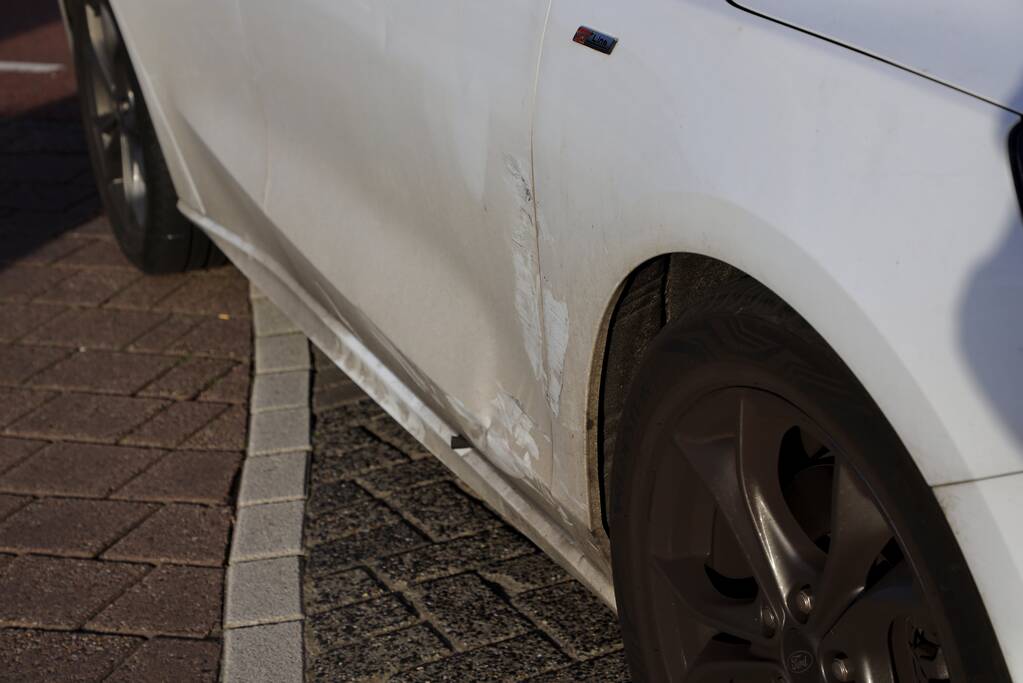 Botsing tussen personenauto en scooter