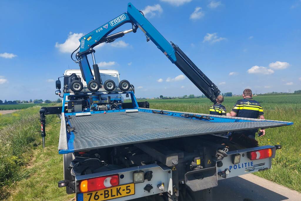 Bestuurder driewieler belandt in sloot