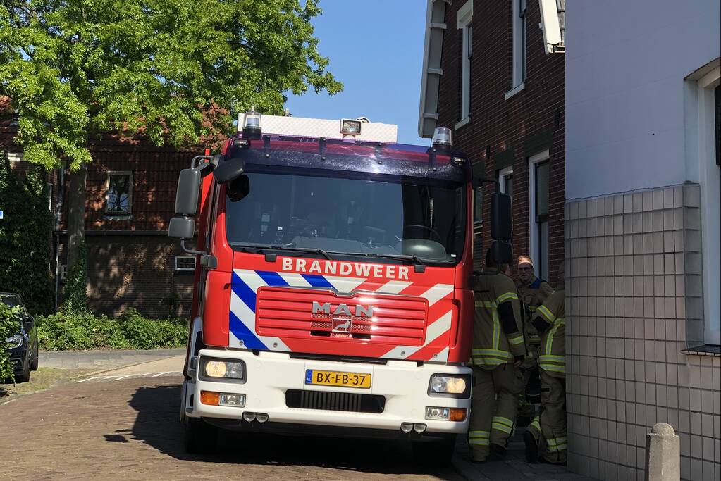 Witgoed-apparaat vat vlam in woning