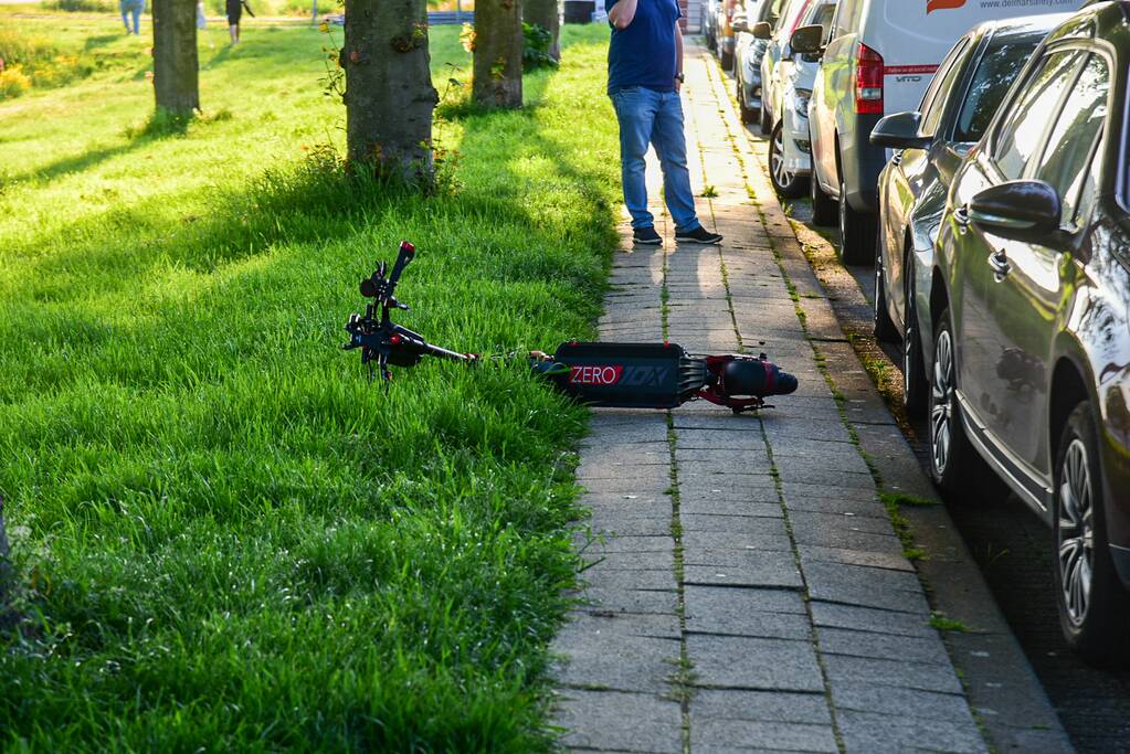 Persoon ten val met elektrische step