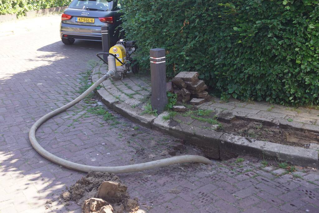 Stoep opengebroken door waterlekkage