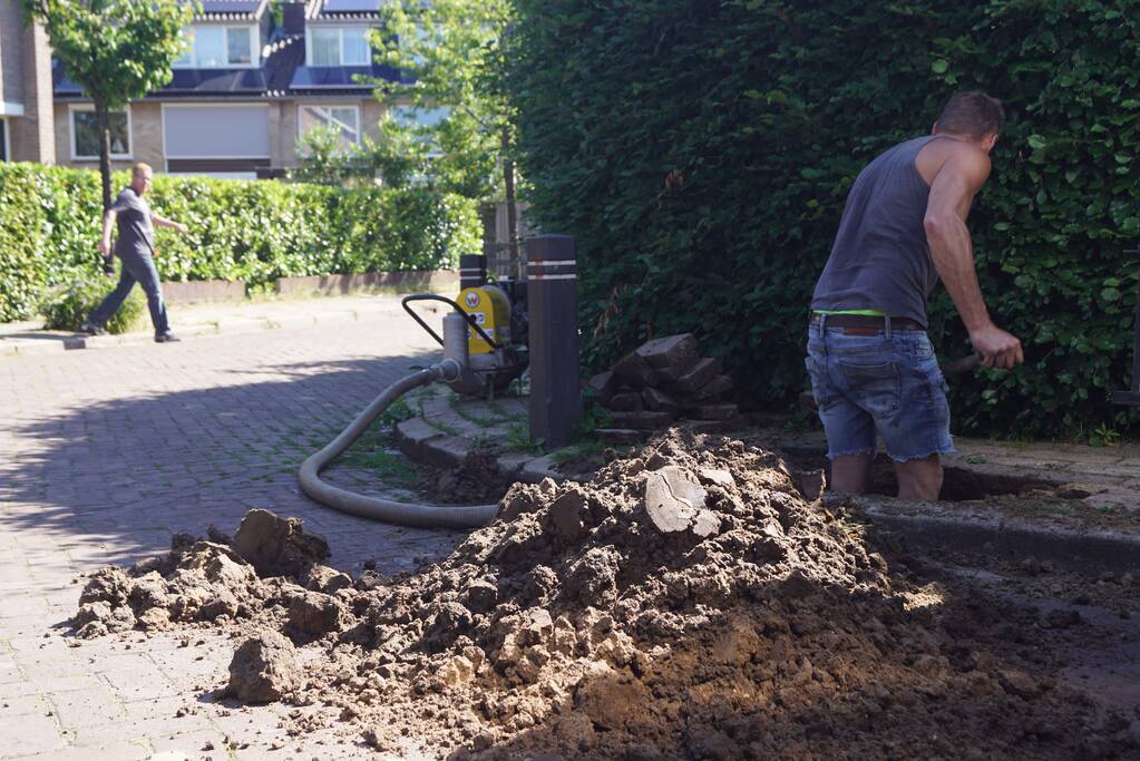 Stoep opengebroken door waterlekkage