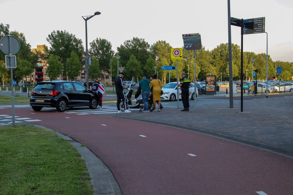 Scooter flink beschadigd na ongeval met auto