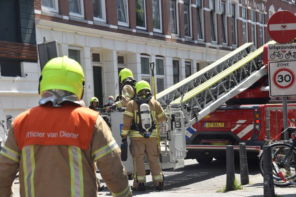 Forse rookontwikkeling bij brandt uit schoorsteen