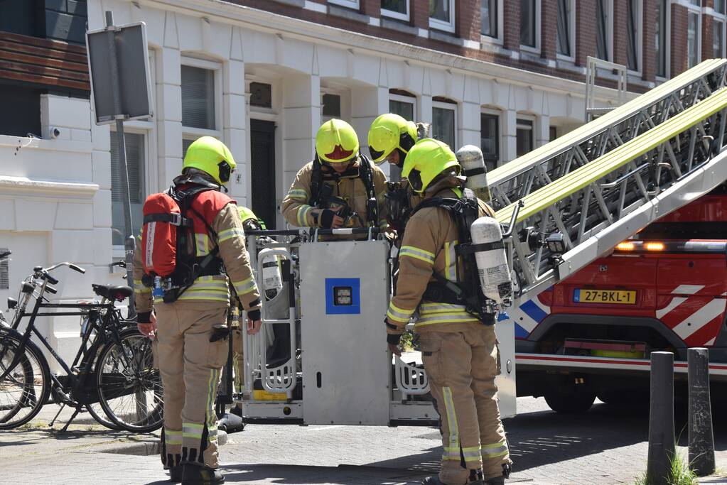 Forse rookontwikkeling bij brandt uit schoorsteen
