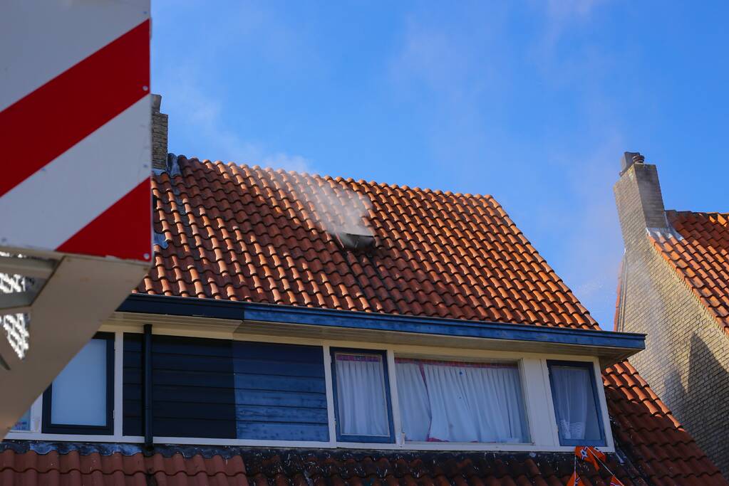 Grijze rookontwikkeling brand in woning