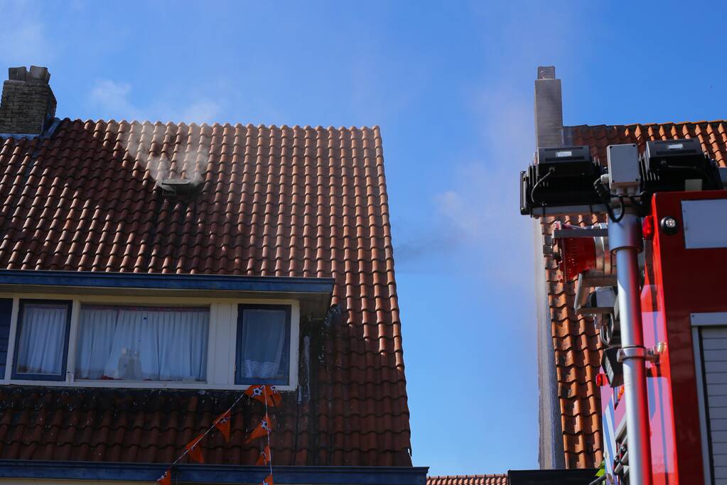 Grijze rookontwikkeling brand in woning