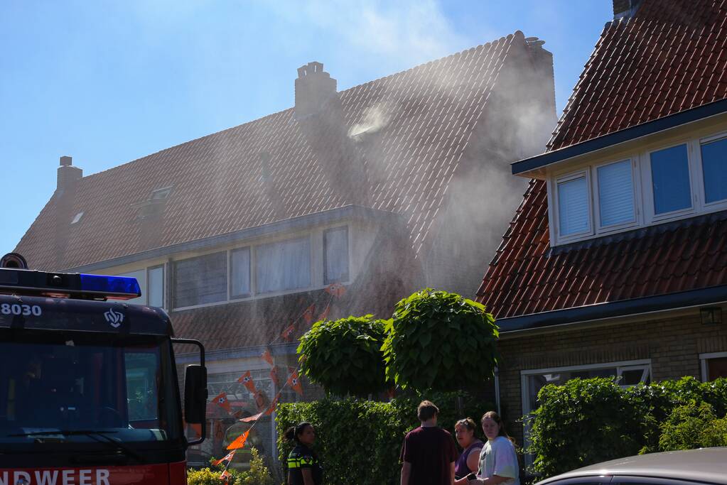 Grijze rookontwikkeling brand in woning
