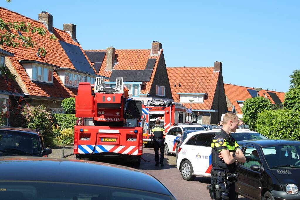 Grijze rookontwikkeling brand in woning