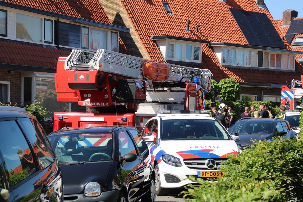Grijze rookontwikkeling brand in woning