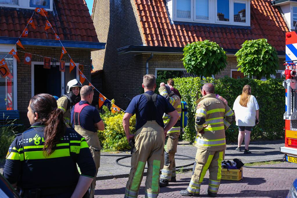 Grijze rookontwikkeling brand in woning