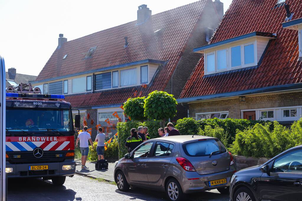 Grijze rookontwikkeling brand in woning