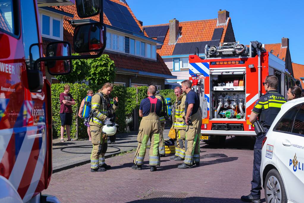 Grijze rookontwikkeling brand in woning