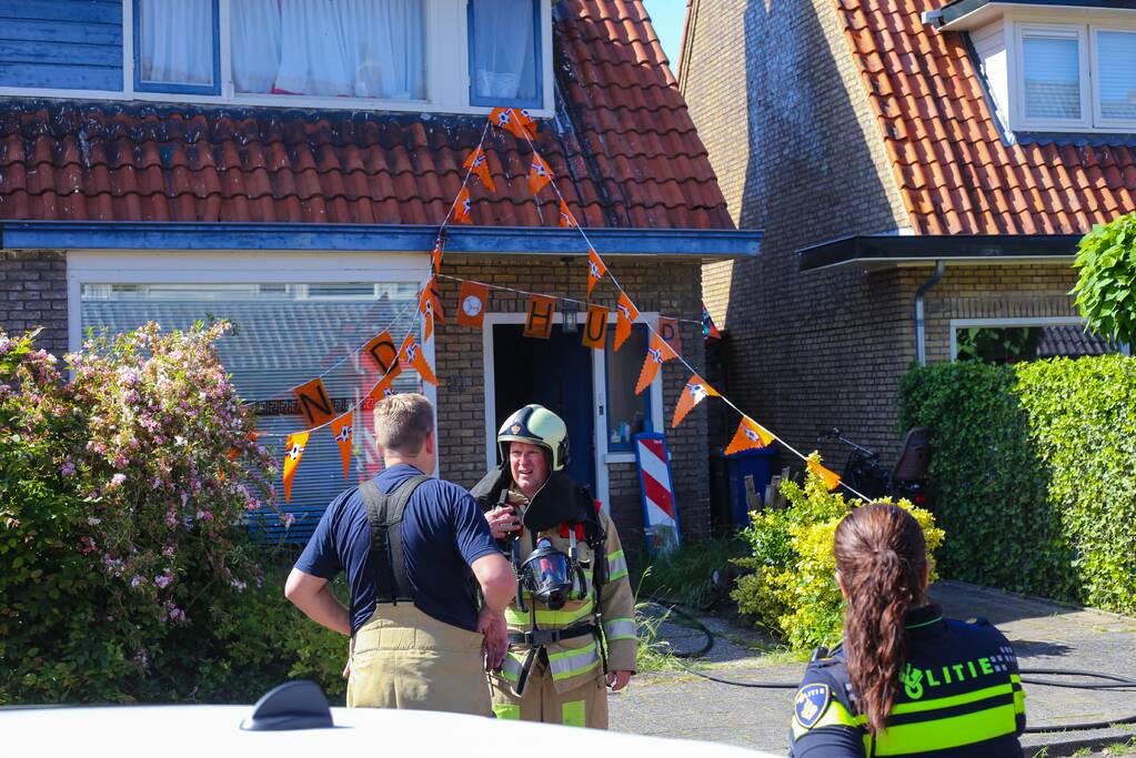 Grijze rookontwikkeling brand in woning