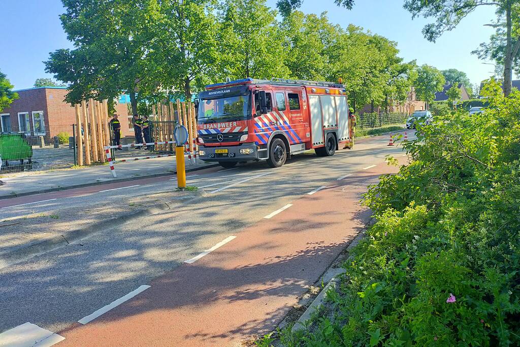 Afvalbak in brand op schoolplein