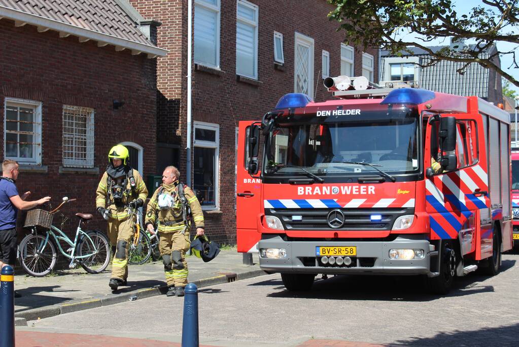 Brand in woning boven winkelpand