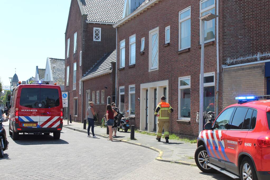 Brand in woning boven winkelpand