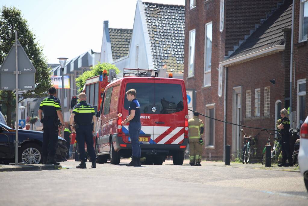 Brand in woning boven winkelpand