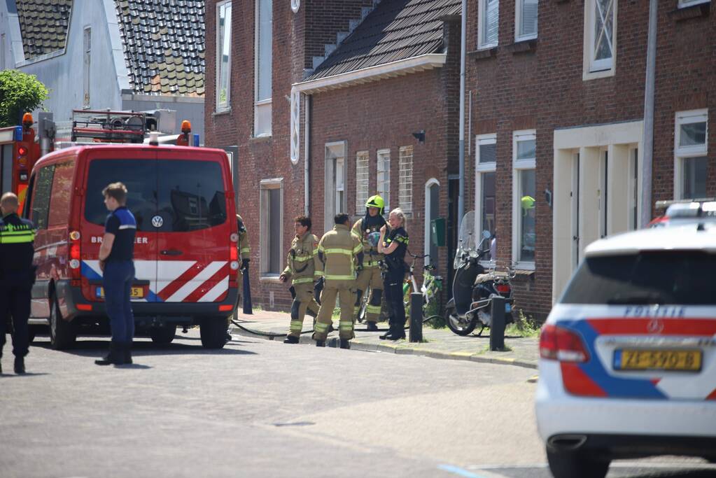 Brand in woning boven winkelpand
