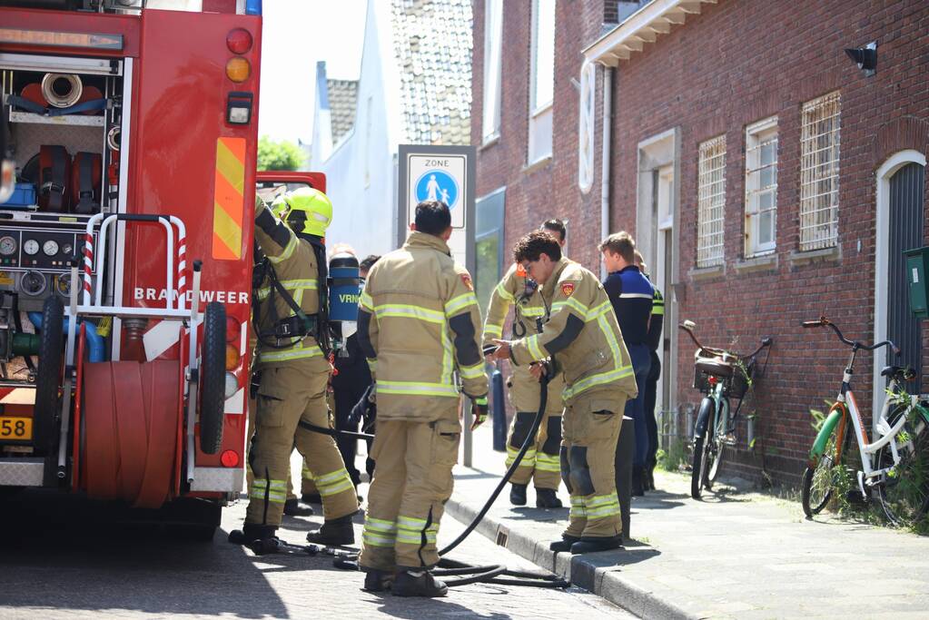 Brand in woning boven winkelpand