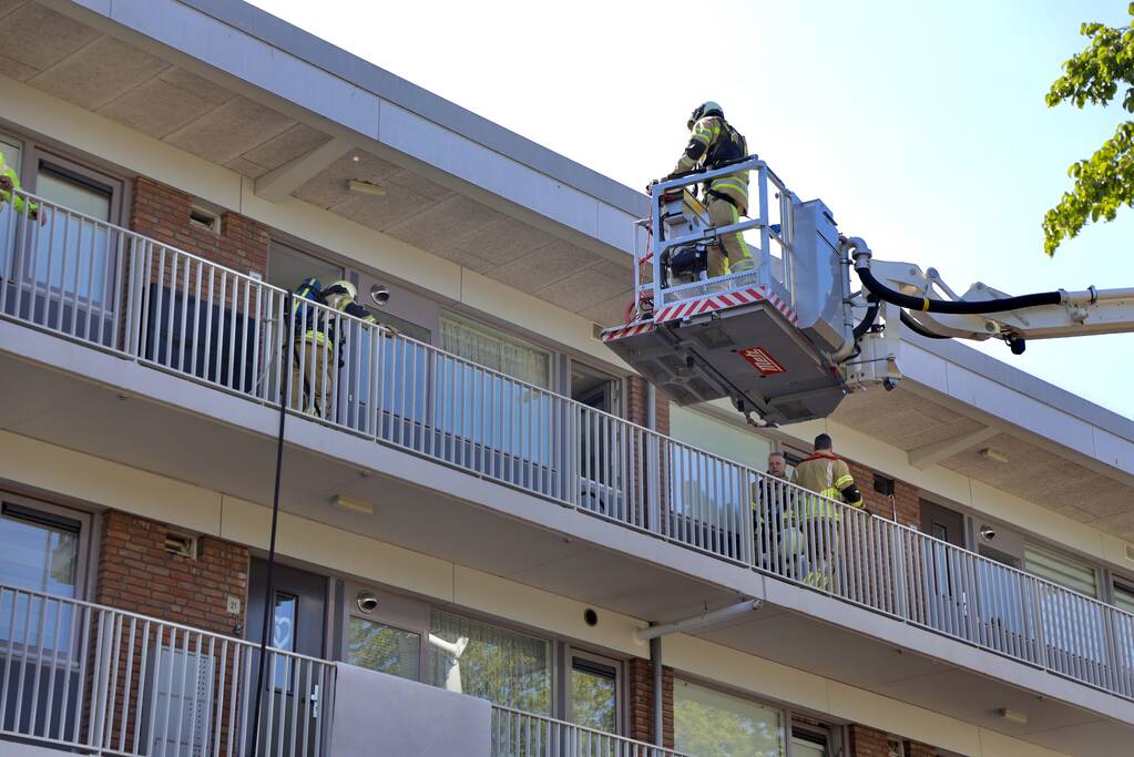Brand op derde verdieping in flatwoning