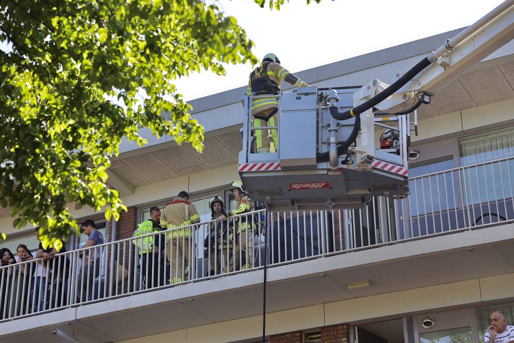 Brand op derde verdieping in flatwoning