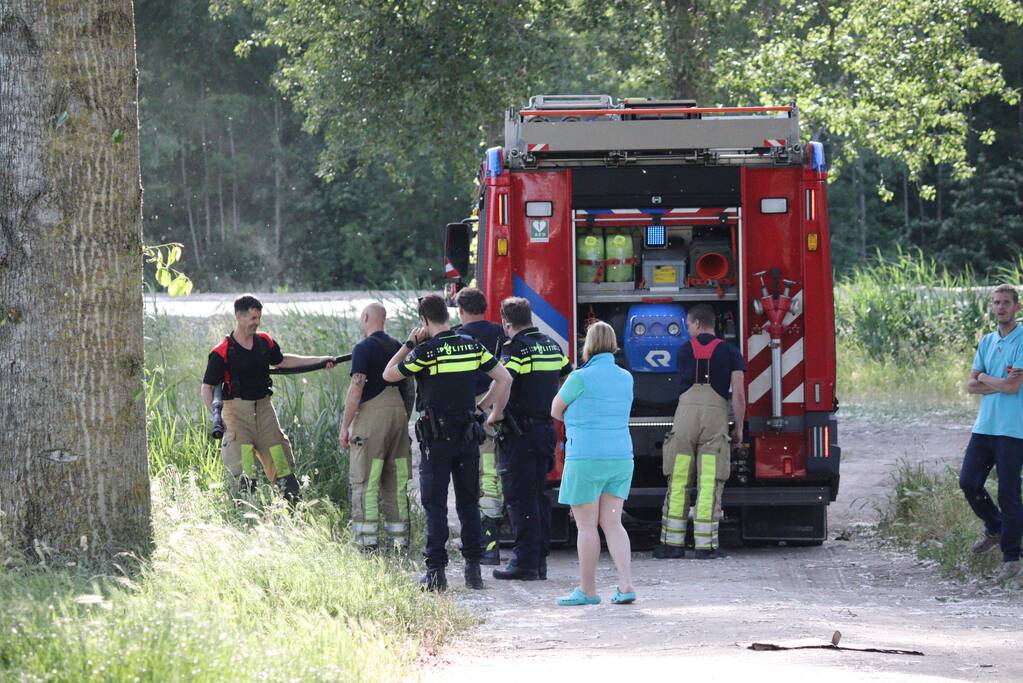 Brandweer blust bermbrand