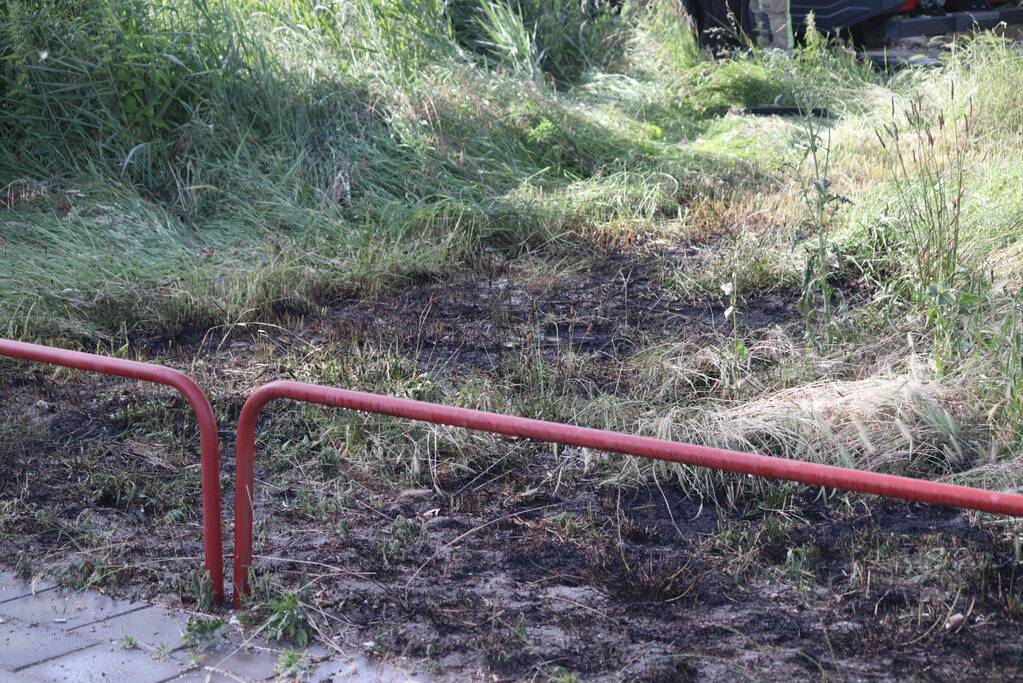 Brandweer blust bermbrand