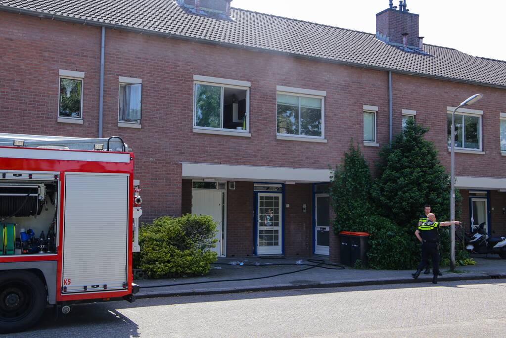 Deur woning opengeramd bij brand in woning