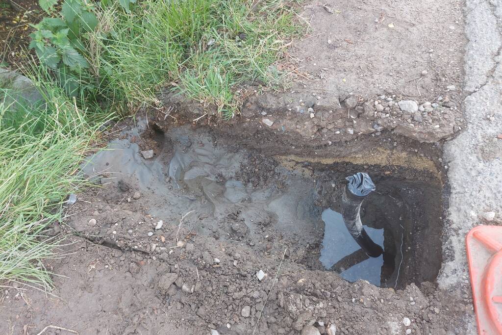 Zand verzakt door waterlekkage