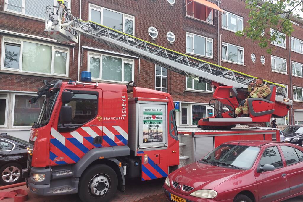 Brand in portiekwoning