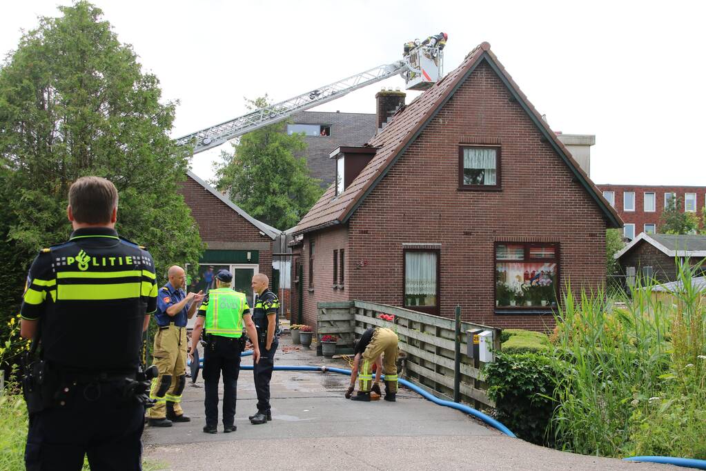 Flinke schade aan dak na woningbrand