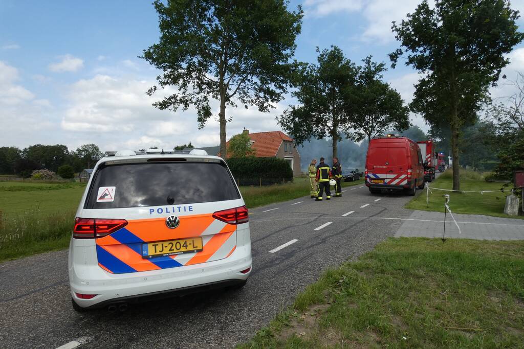 Stuk struiken gaan in vlammen op