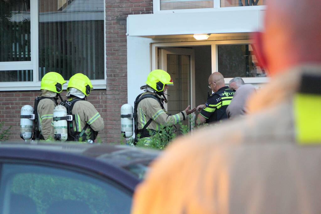 Flat deels ontruimd door brandlucht