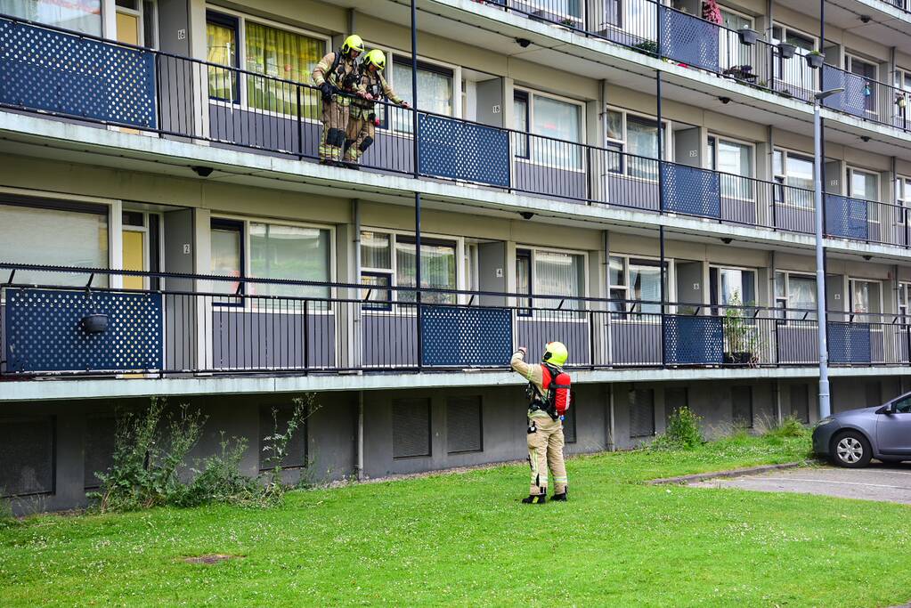 Bank in kelderruimte in brand gevlogen