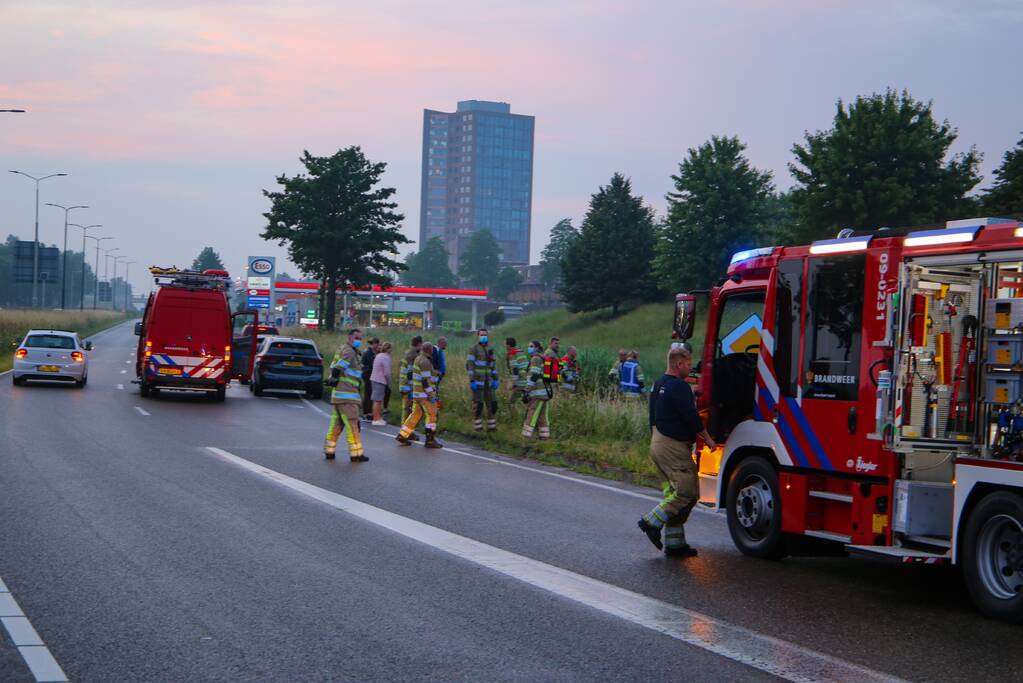 Persoon gered uit te water geraakte auto