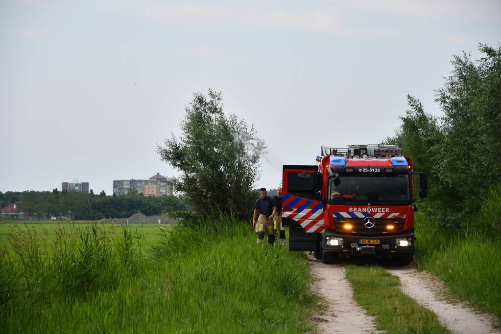 Omwonende ontdekt brand in bosjes