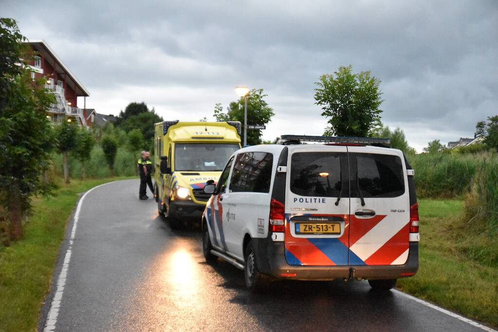 Bestuurder invalidevoertuig haalt nat pak bij te water raken