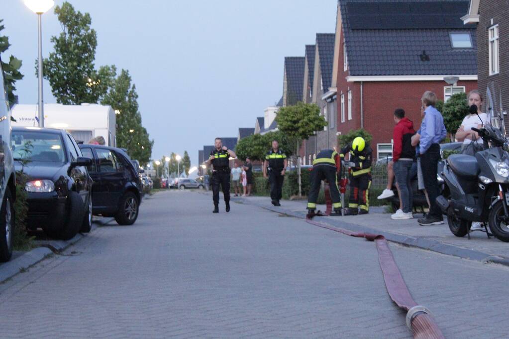 Omgeving ontruimd door brand in tuinhuis