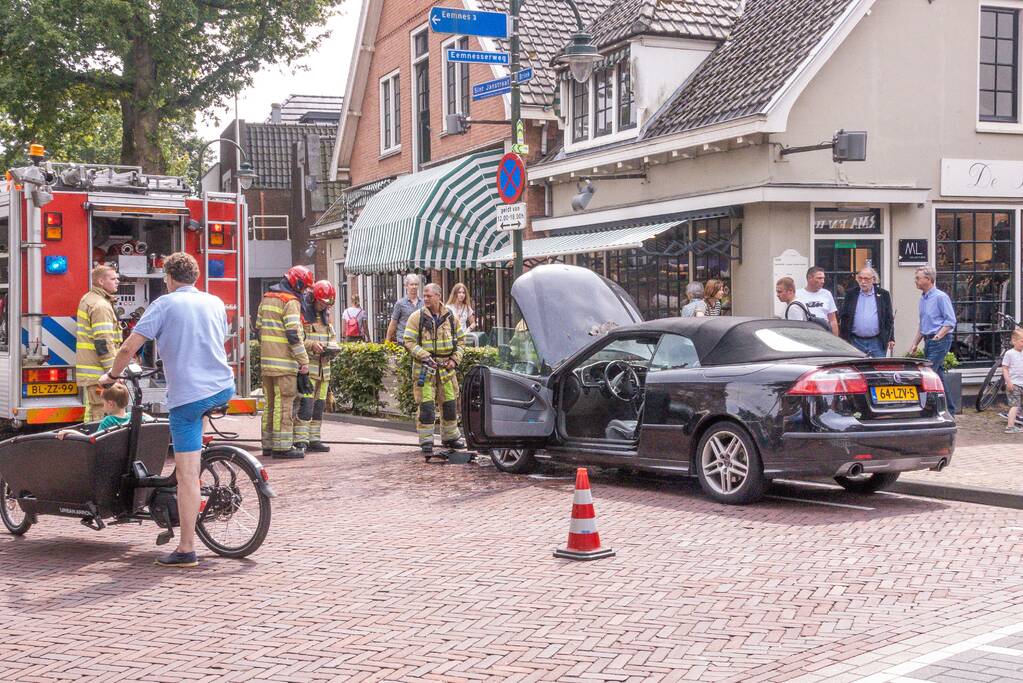 Motorcompartiment auto vat vlam