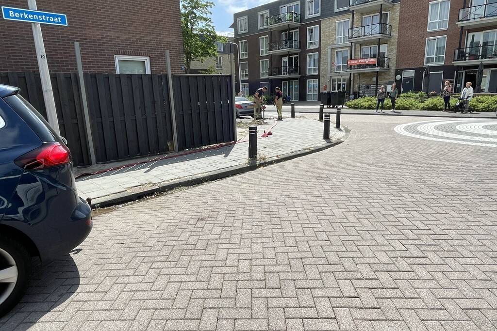 Schutting in achtertuin beschadigd door brand