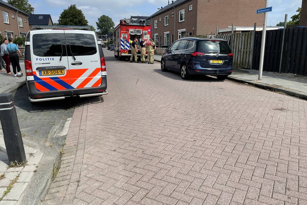 Schutting in achtertuin beschadigd door brand