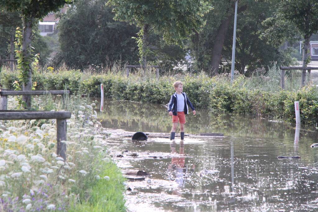 Overstromingen door stijgend water in de maas