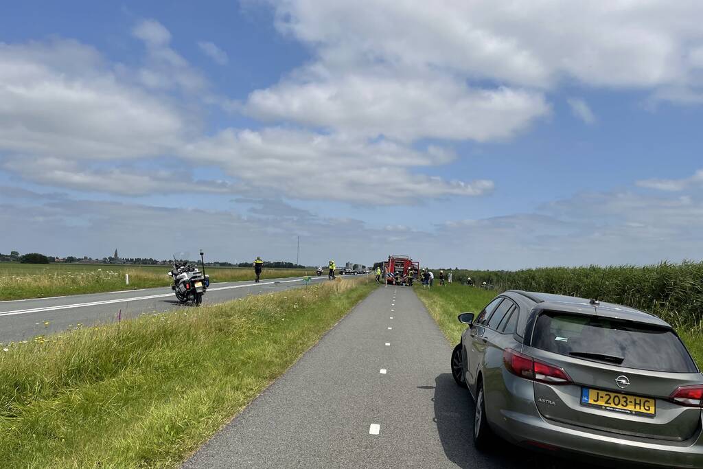 Auto's belanden in sloot