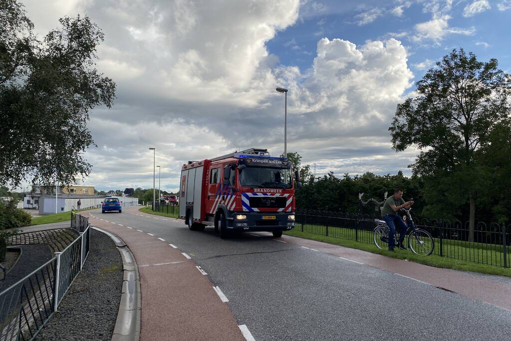 Rook uit schoorsteen van woning