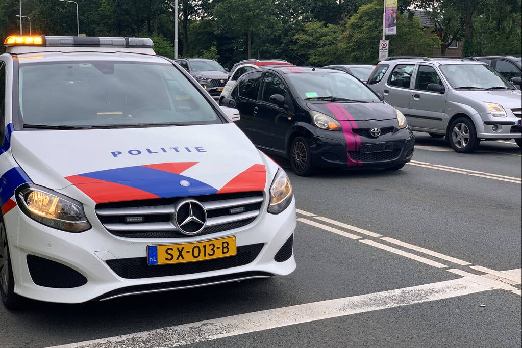 Kop-staart botsing voor stoplicht