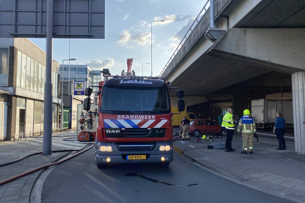 Grote uitslaande brand in een leegstaand pand