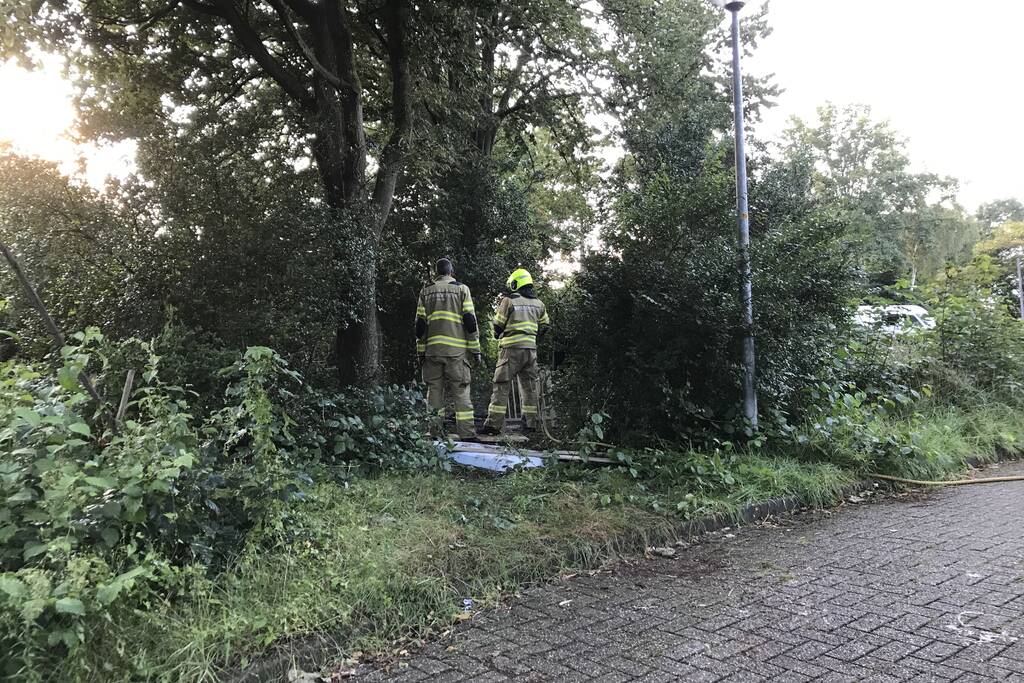 Afval in brand gestoken in bosjes