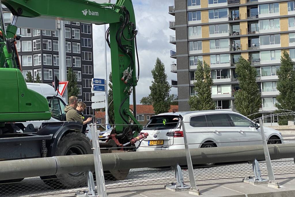 Veel schade door kop-staart botsing met graafmachine